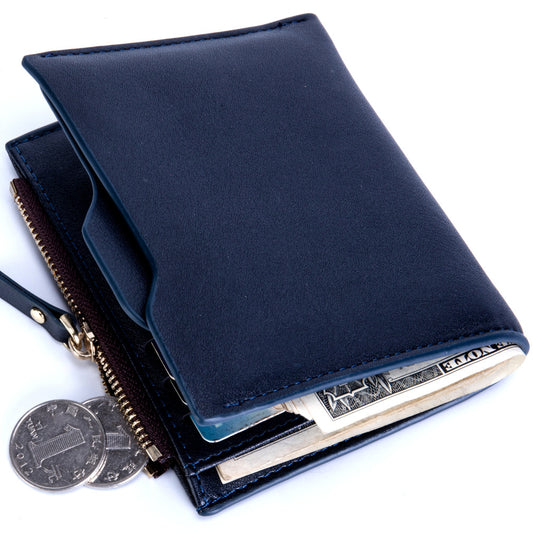 Navy blue wallet with coins and money on a white background